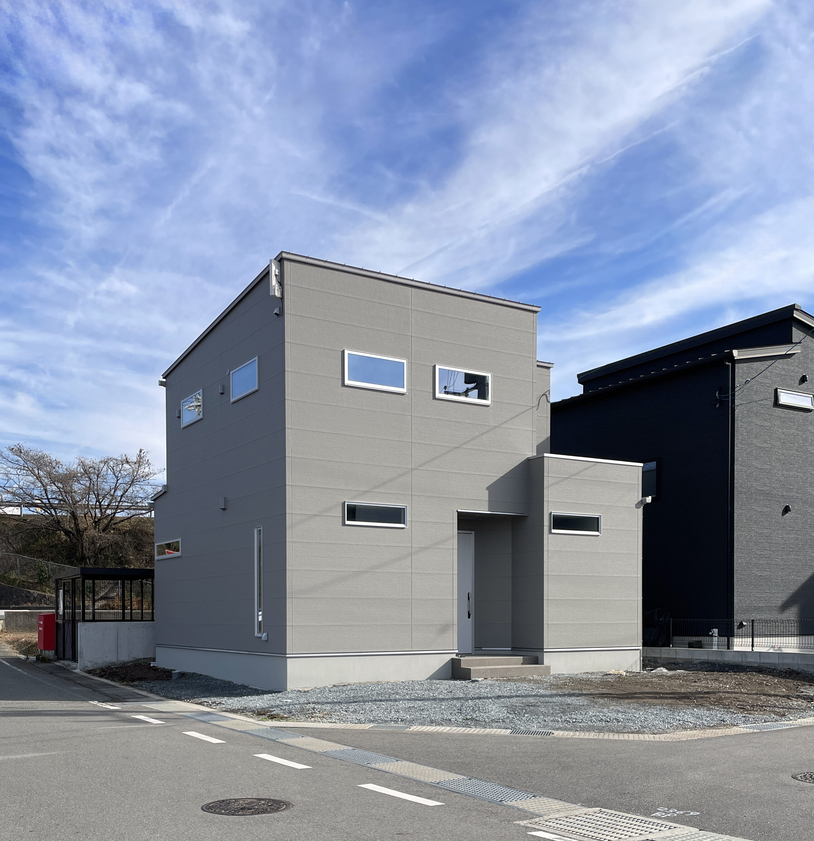 グレー×石目調の無機質で洗練された家